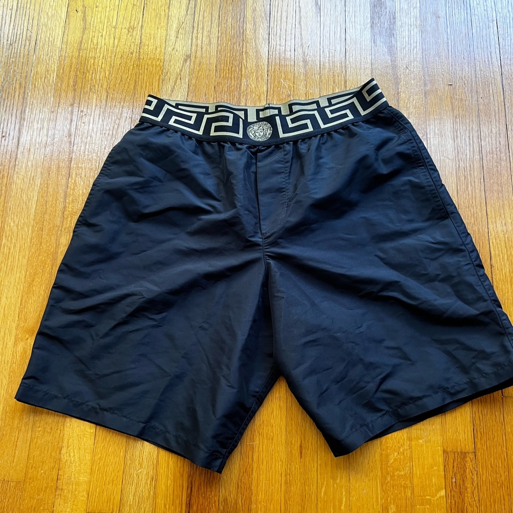 Men’s Versace bathing suit. Size 3. Barely worn. Good as new condition.